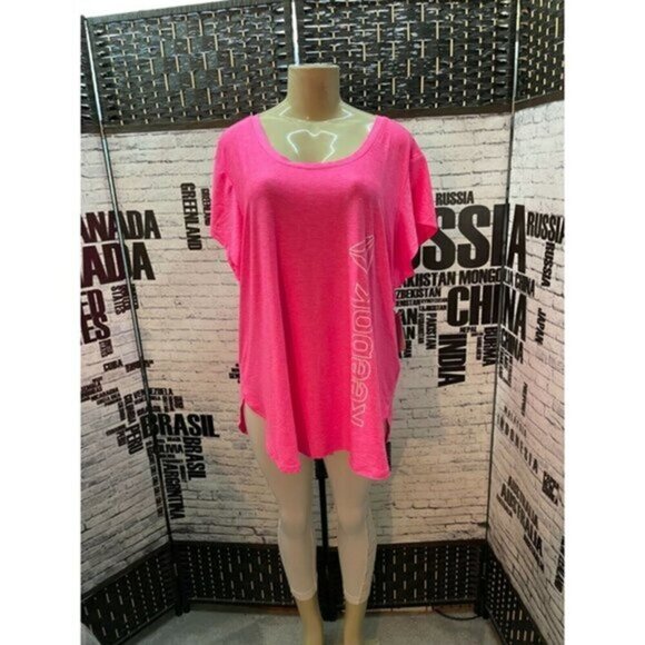 Reebok Plus 2X Pink Logo Scoop Neck Step-Hem Short Sleeve Top - Picture 1 of 6